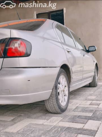Nissan Primera II (P11) Рестайлинг 1.8 MT