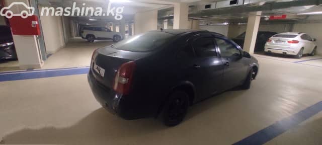 Nissan Primera III (P12) 1.6 MT