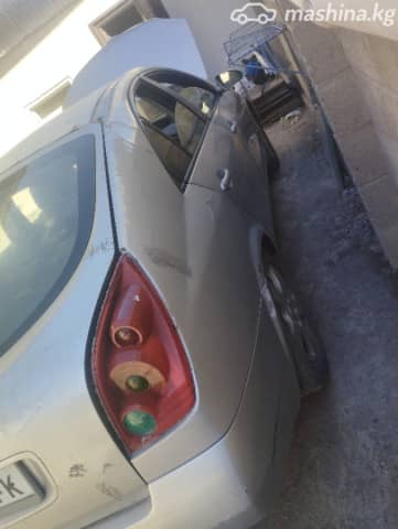 Nissan Primera III (P12) 1.8 MT