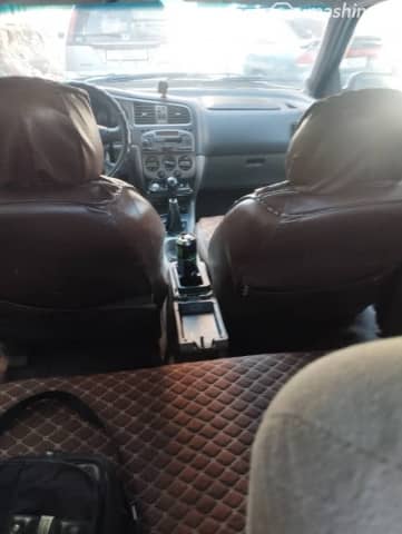 Nissan Primera II (P11) Рестайлинг 2.0 MT