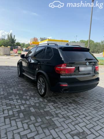 BMW X5 II (E70) 48i 4.8 AT 4WD