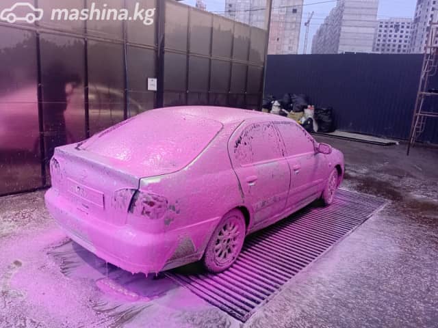 Nissan Primera II (P11) Рестайлинг 1.8 MT