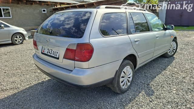 Nissan Primera II (P11) Рестайлинг 1.8 MT