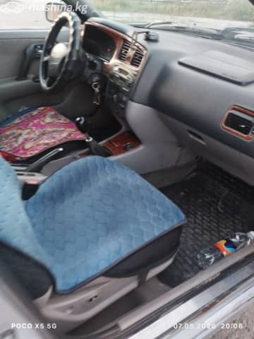 Nissan Primera II (P11) Рестайлинг 1.8 MT