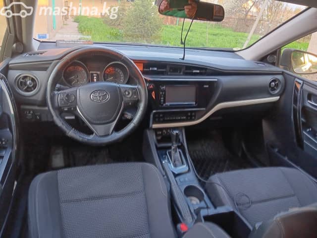 Toyota Corolla XI (E160, E170) Рестайлинг 2 Axio 1.5 CVT 4WD