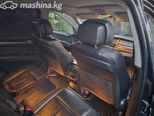 BMW X5 II (E70) 48i 4.8 AT 4WD