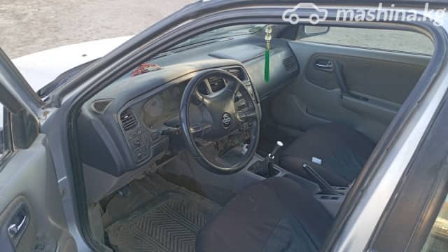 Nissan Primera II (P11) Рестайлинг 1.8 MT