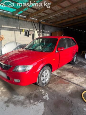 Mazda 323 VI (BJ) Рестайлинг 1.6 MT