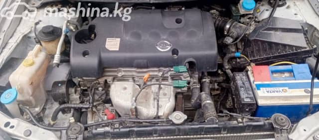 Nissan Primera III (P12) 1.8 MT