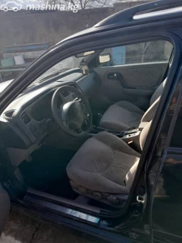 Nissan Primera II (P11) Рестайлинг 2.0 MT