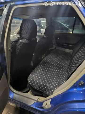 Mazda 323 VI (BJ) Рестайлинг 1.6 MT
