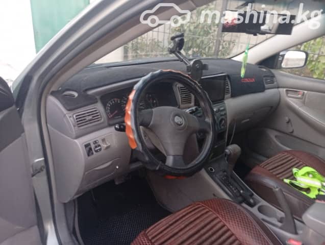 Toyota Corolla IX (E120, E130) 1.8 AT