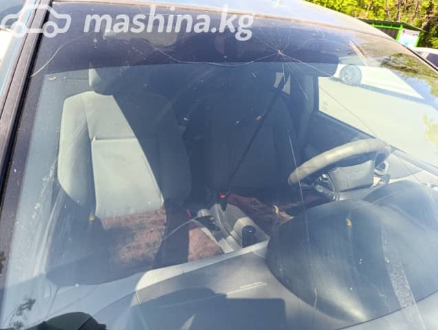 Nissan Almera Tino 1.8 MT