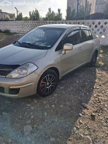 Nissan Tiida I 1.6 MT