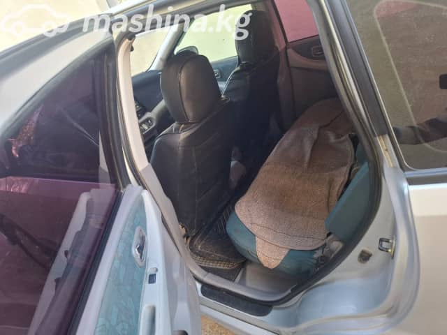 Nissan Almera Tino 1.8 MT