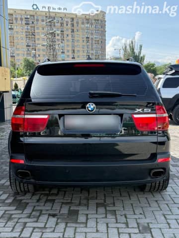 BMW X5 II (E70) 48i 4.8 AT 4WD