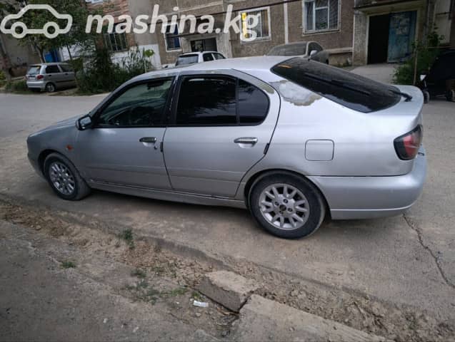 Nissan Primera II (P11) Рестайлинг 1.8 MT