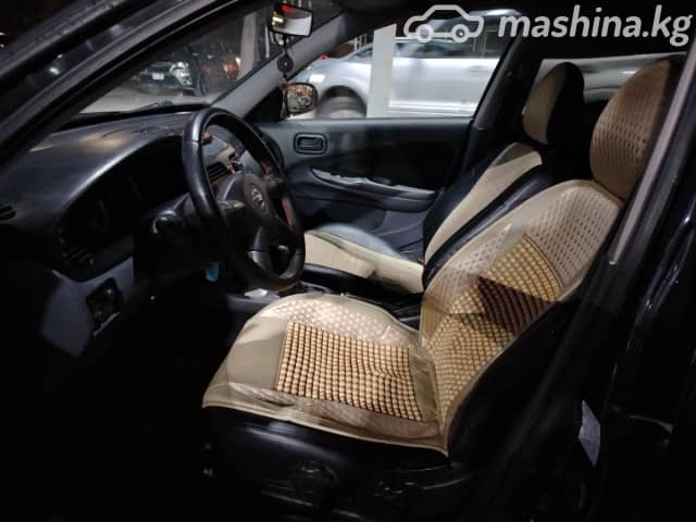 Nissan Almera II (N16) Рестайлинг 1.5 MT