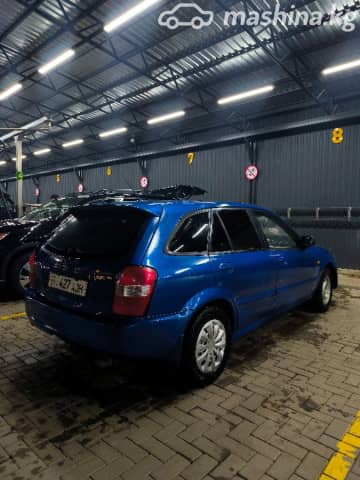 Mazda 323 VI (BJ) Рестайлинг 1.6 MT
