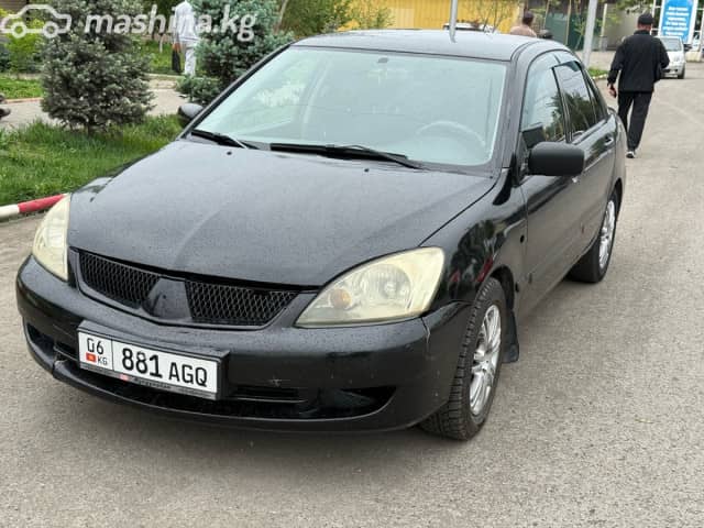Mitsubishi Lancer IX Рестайлинг 1.6 AT