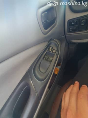 Nissan Almera II (N16) 1.8 MT