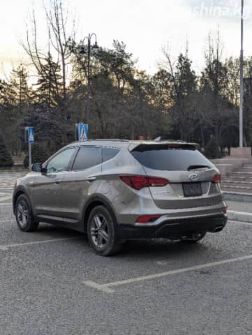 Hyundai Santa Fe III Рестайлинг 2.4 AT
