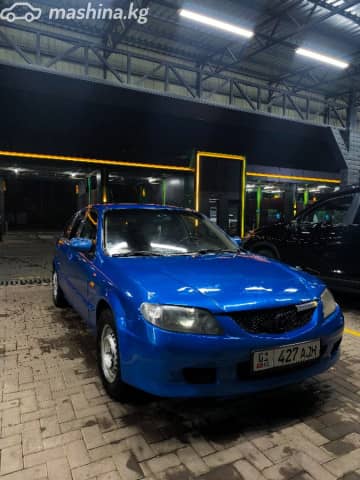 Mazda 323 VI (BJ) Рестайлинг 1.6 MT