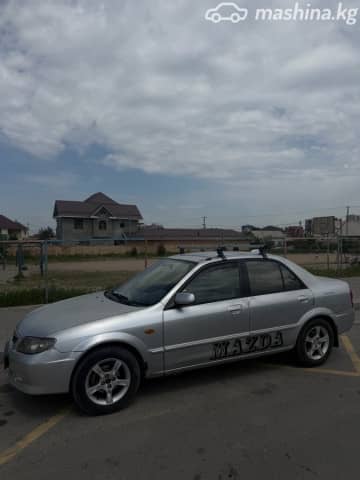 Mazda 323 VI (BJ) Рестайлинг 1.6 MT