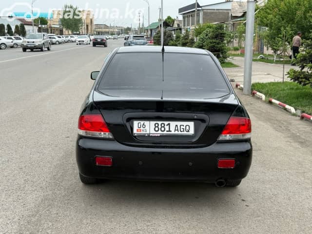 Mitsubishi Lancer IX Рестайлинг 1.6 AT