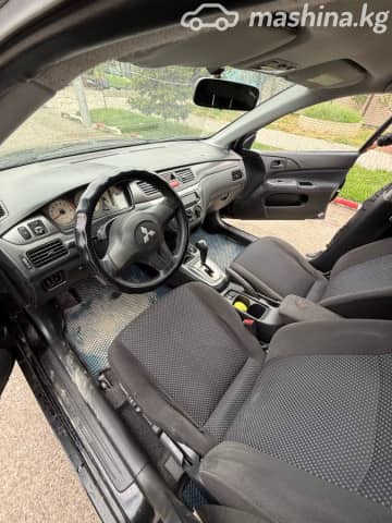 Mitsubishi Lancer IX Рестайлинг 1.6 AT