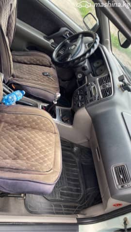 Nissan Primera II (P11) Рестайлинг 1.8 MT