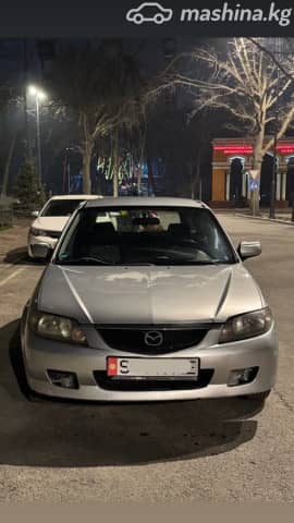 Mazda 323 VI (BJ) Рестайлинг 1.6 MT