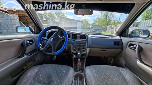 Nissan Primera II (P11) Рестайлинг 1.8 MT