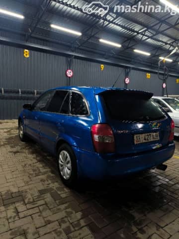 Mazda 323 VI (BJ) Рестайлинг 1.6 MT