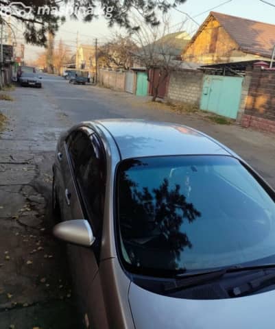 Nissan Primera III (P12) 1.8 AT