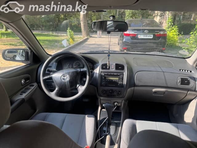 Mazda 323 VI (BJ) Рестайлинг 1.6 AT