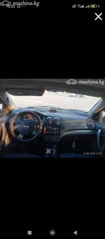 Chevrolet Aveo I Рестайлинг 1.2 MT