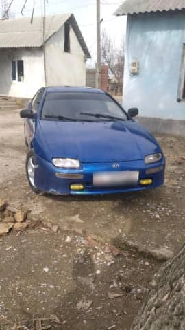 Mazda 323 V (BA) 1.5 MT