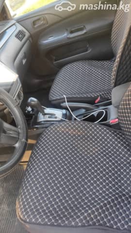 Mitsubishi Lancer IX Рестайлинг 1.6 AT