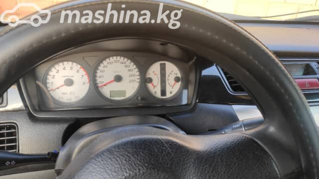 Mitsubishi Lancer IX Рестайлинг 1.6 AT
