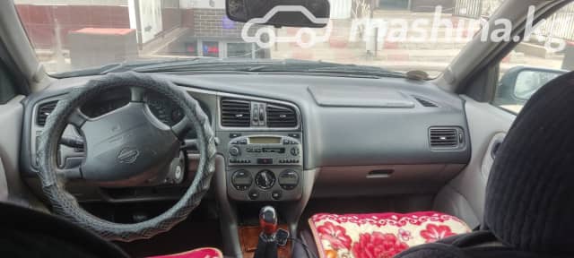 Nissan Primera II (P11) Рестайлинг 1.8 MT